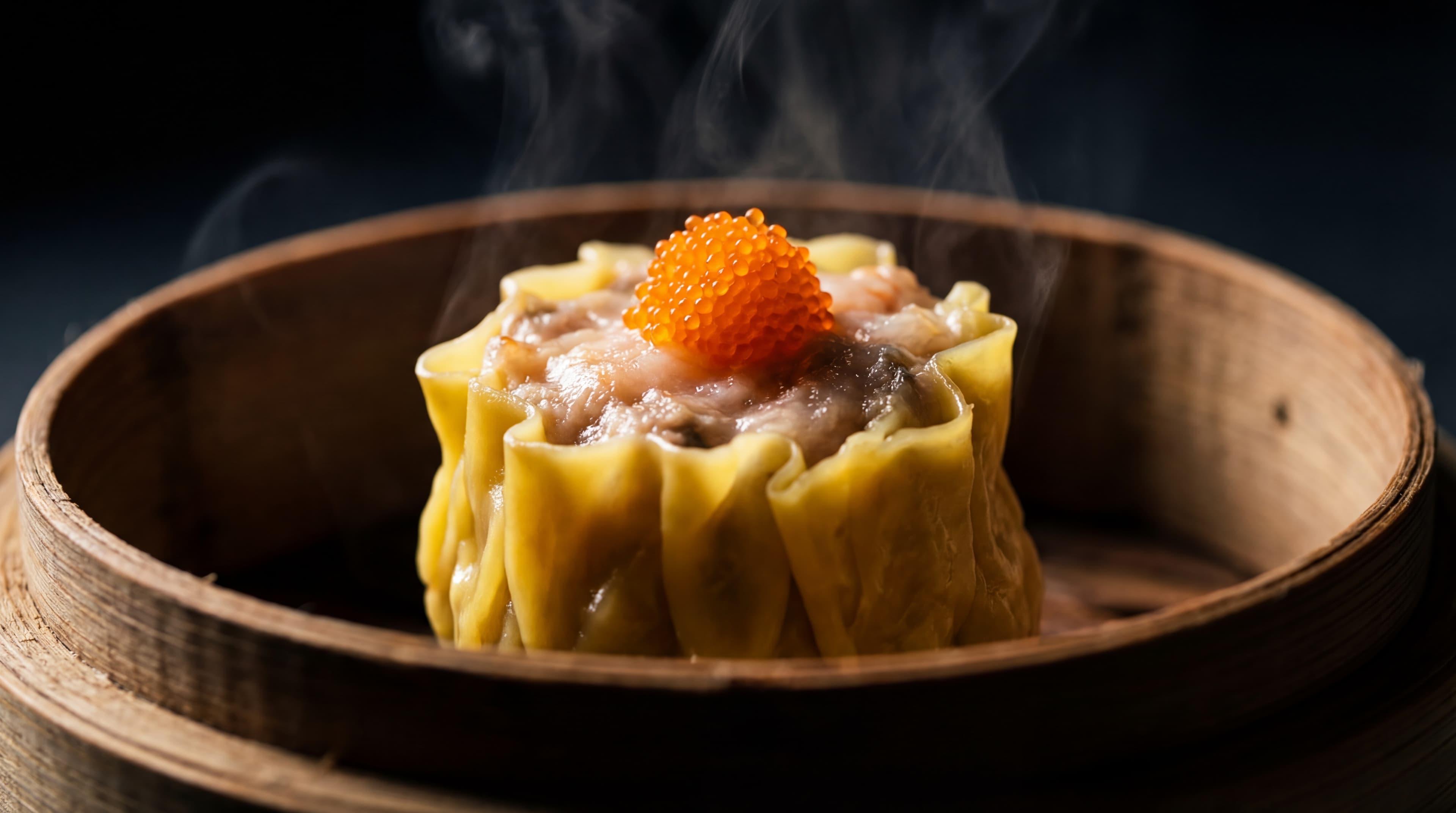 Steamed shumai dumpling with fish roe in bamboo basket